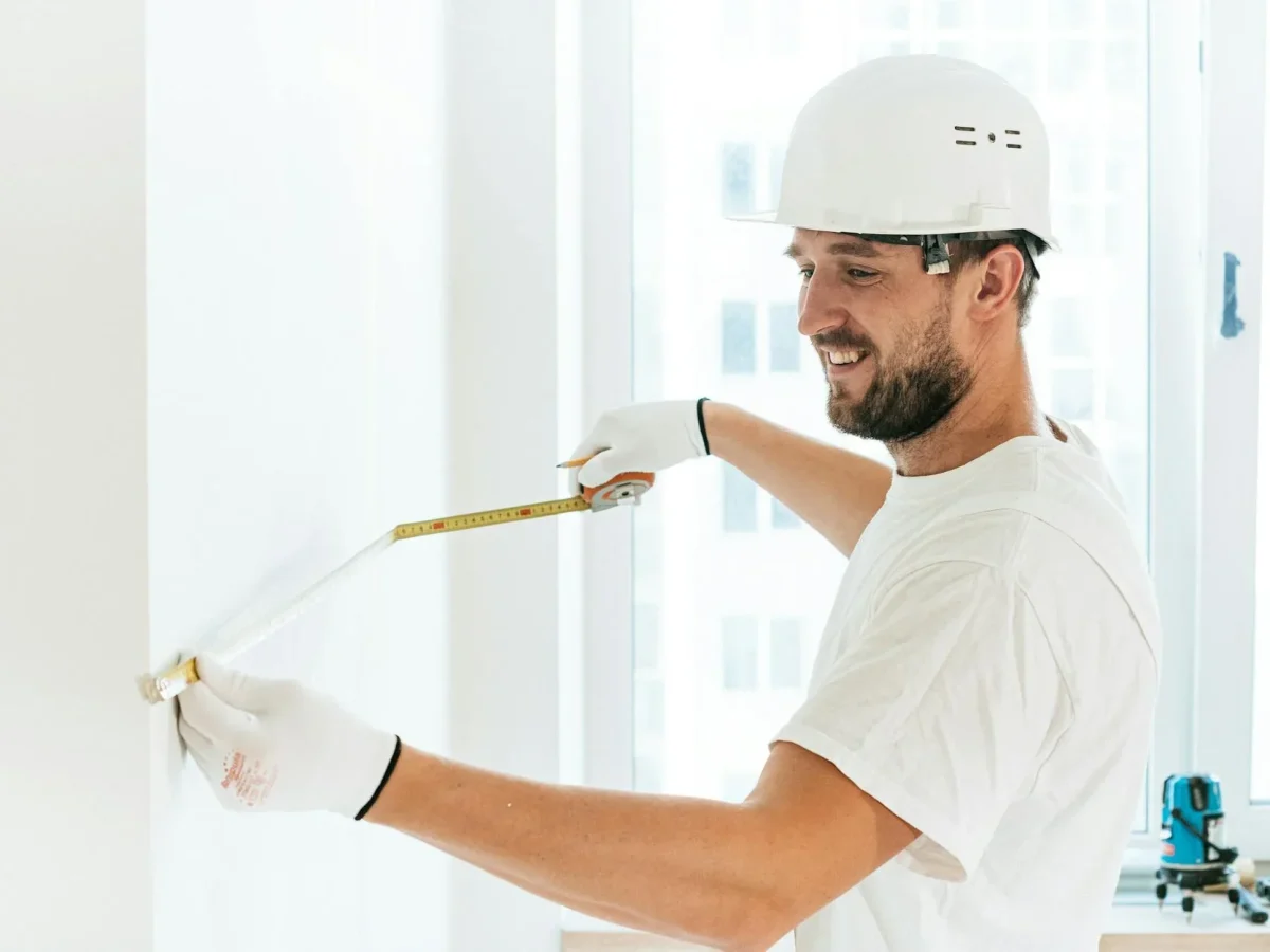 Construction Worker Measuring Tape