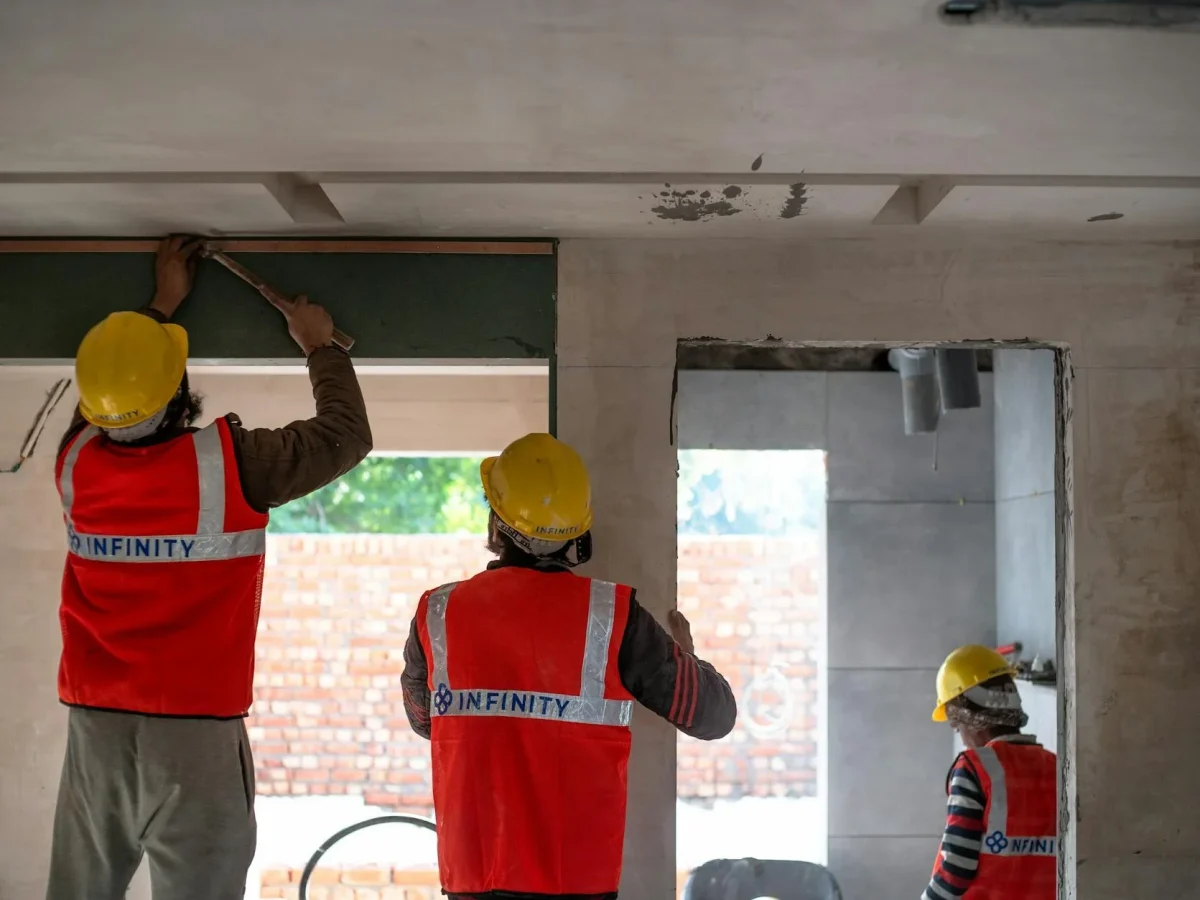 Door Installation Construction Workers
