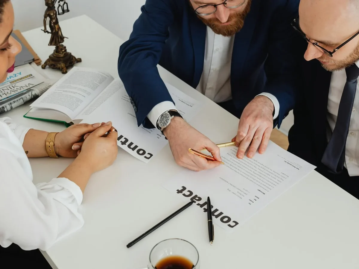 People Discussing Plans Contract