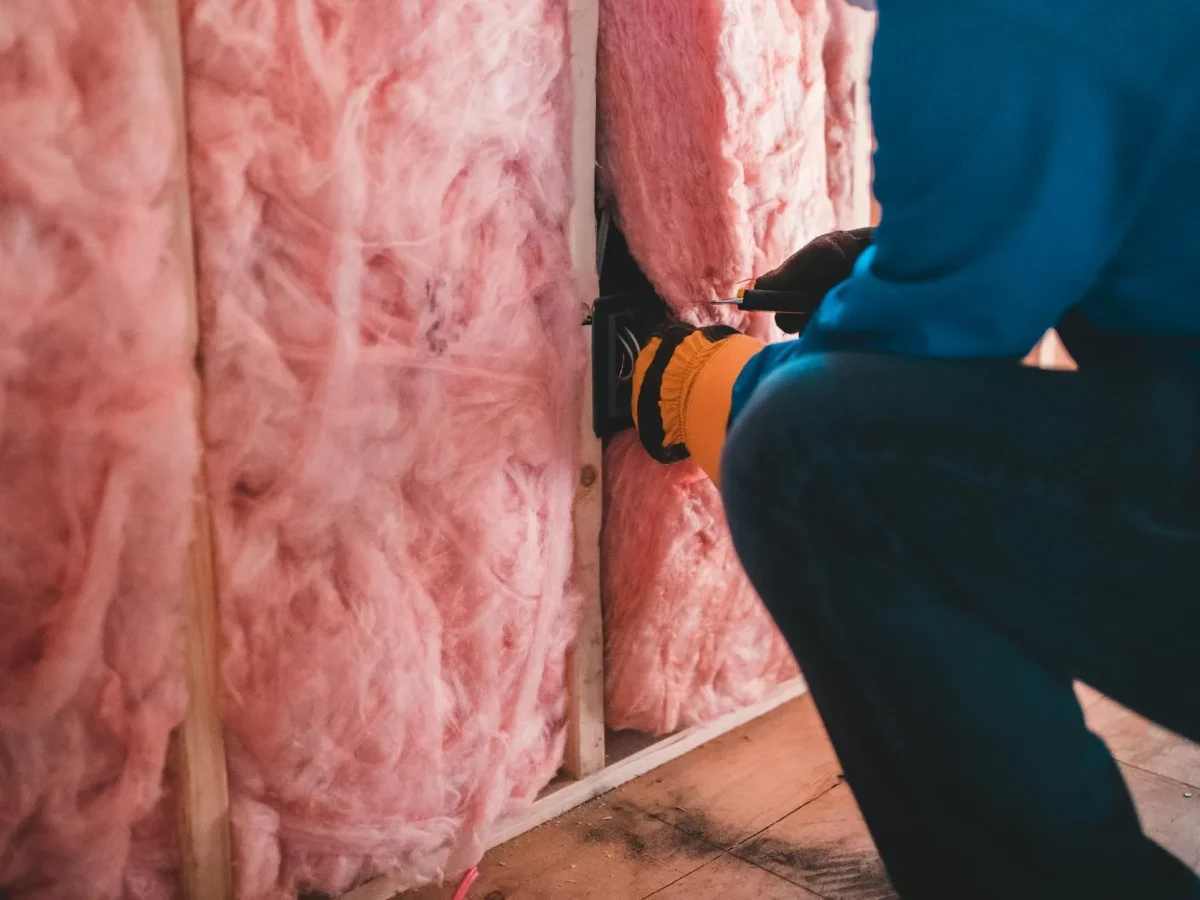 Worker Installing Floor Construction Tools