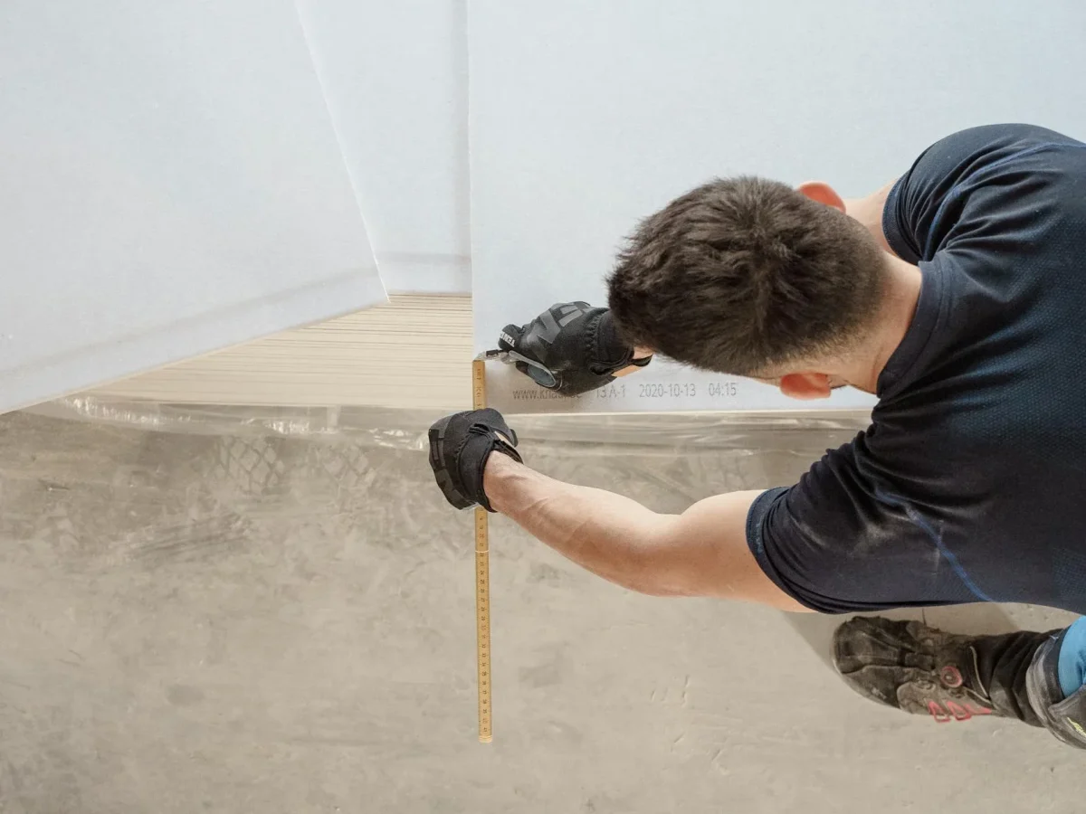 Worker Installing Floor Floor Installation Tools